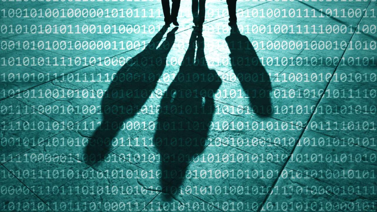 Group of people shadows with binary numbers