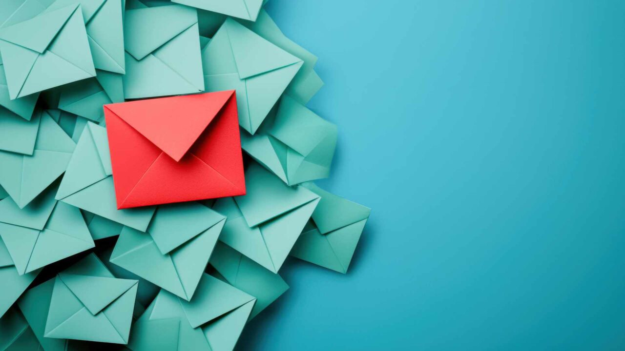 An inbox filled with emails, with one email marked with a red ex